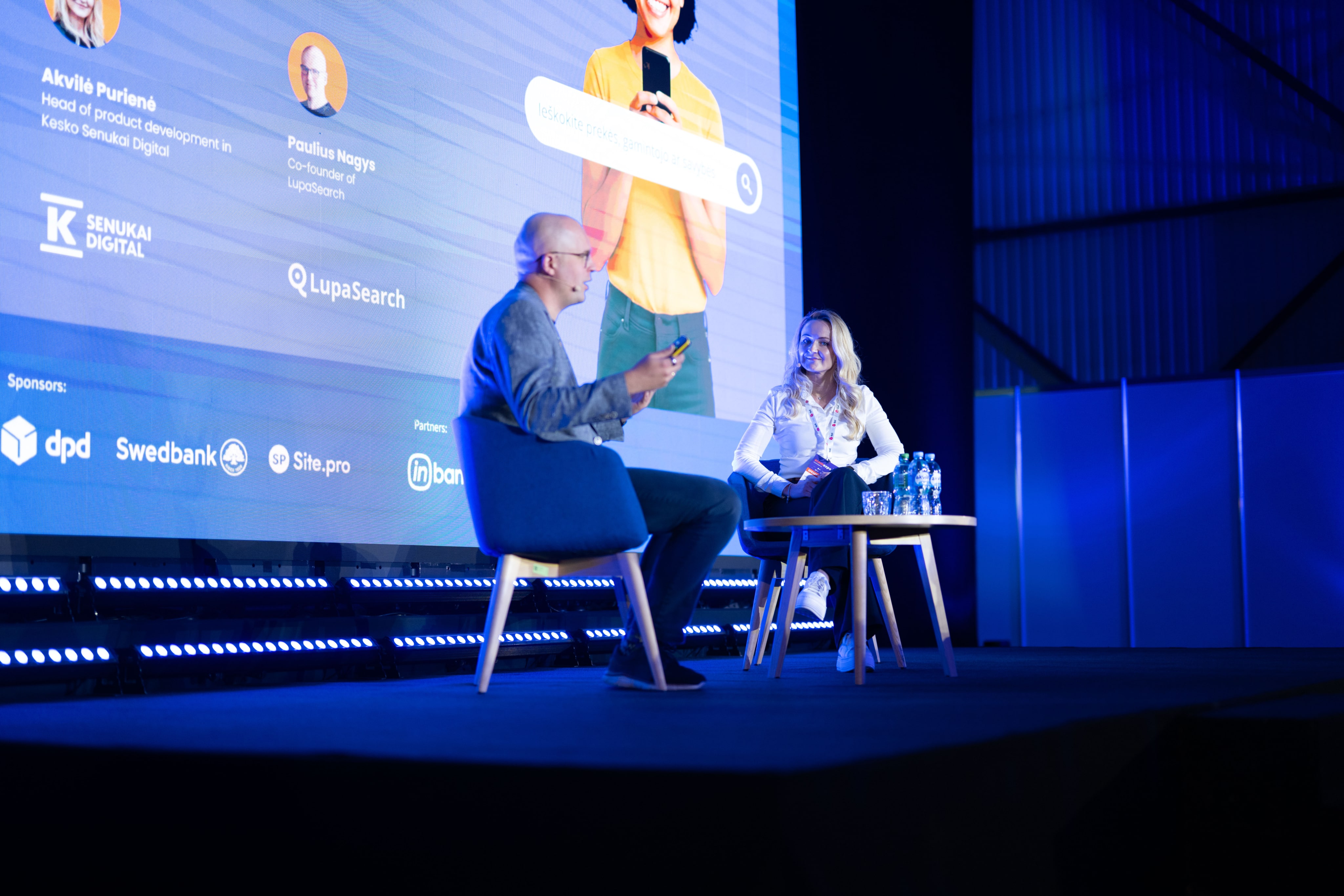 Sharing how LupaSearch fixes broken ecommerce search LupaSearch and Kesko Digital on stage discussing ecommerce search at a tech conference