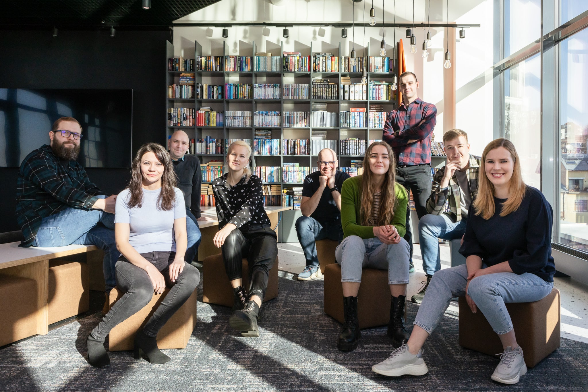 The people building LupaSearch LupaSearch product and engineering team sitting together in a modern office library